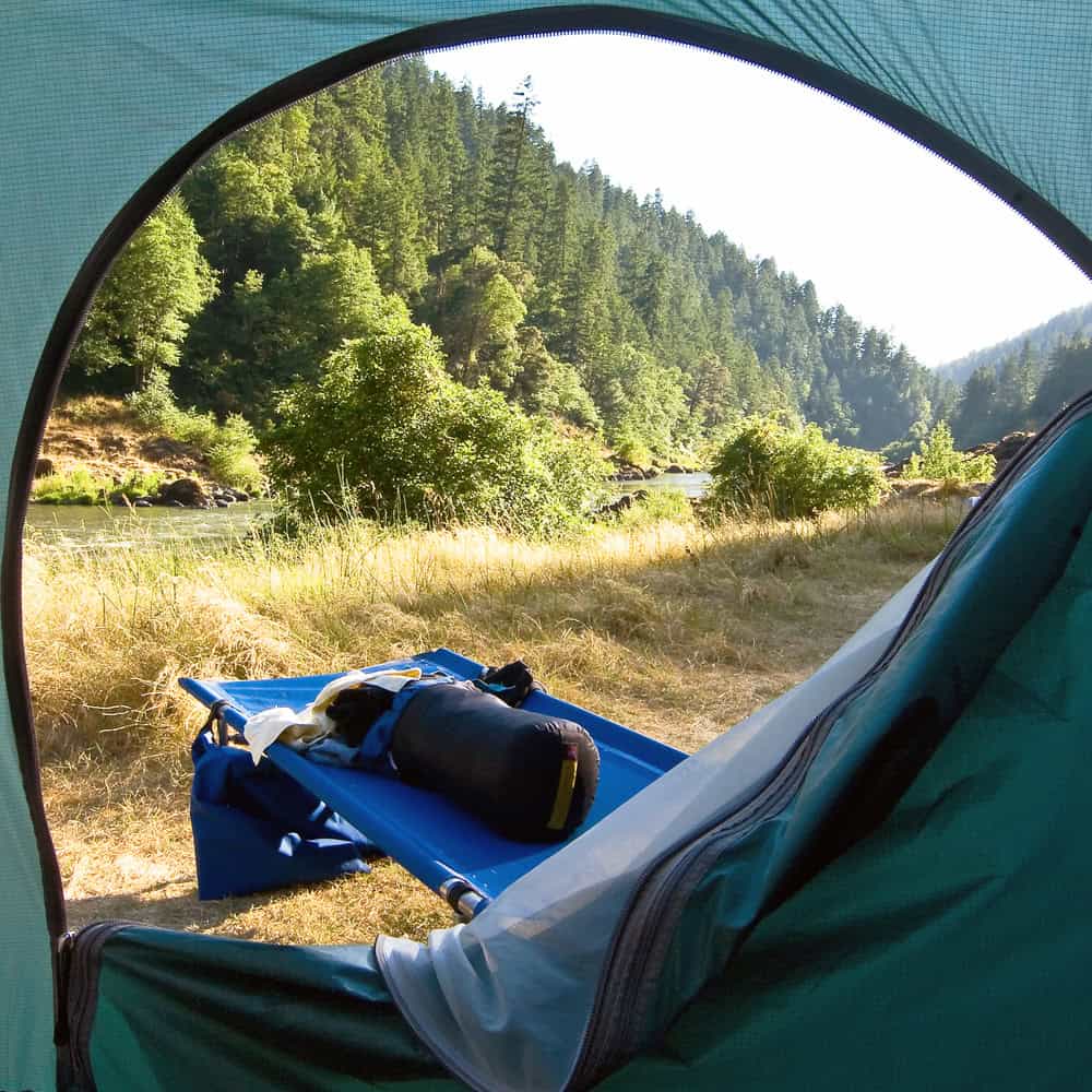 Comfortable riverside camping setup overlooking the Rogue River